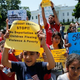 Young children join immigration-reform protesters while marching in front of the White House July 7, 2014, in Washington, D.C.
Win McNamee/Getty Images
